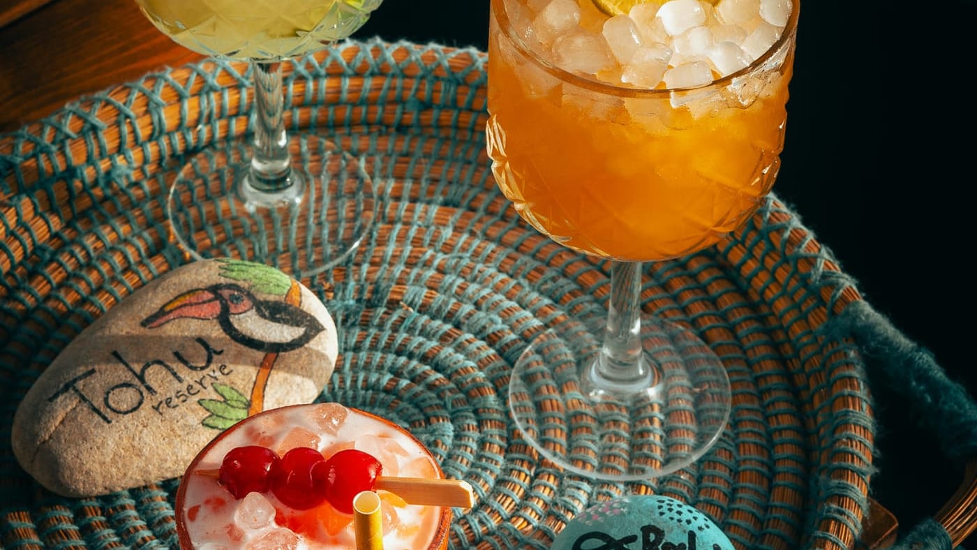 Cocktails served on a woven tray