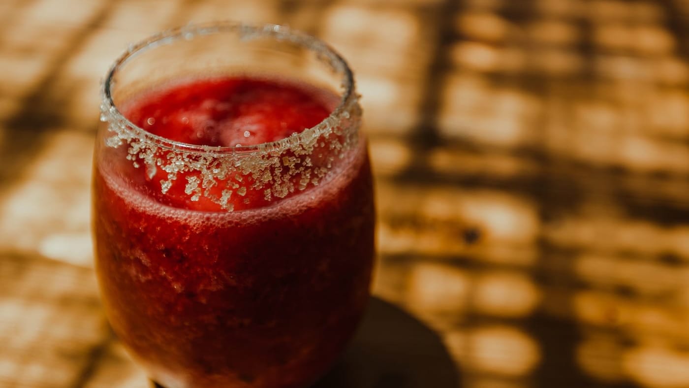 A fresh red juice in the sun