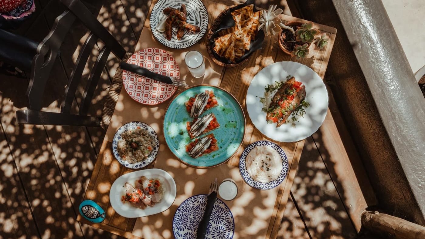 An overhead spread of Greek meze
